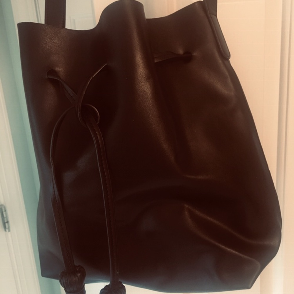 Black man-made leather bucket bag NWOT